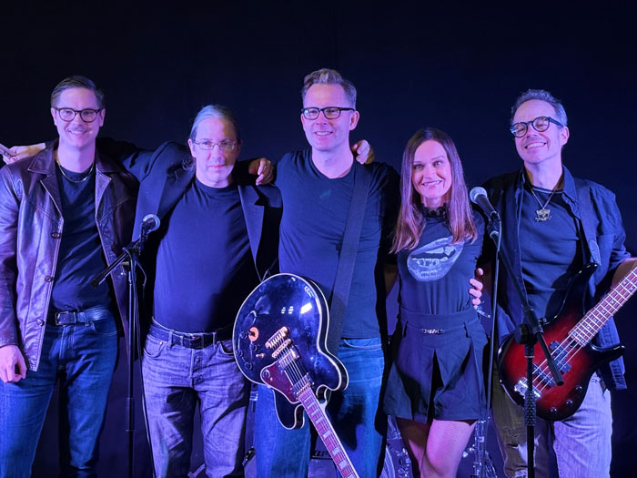 image of band members